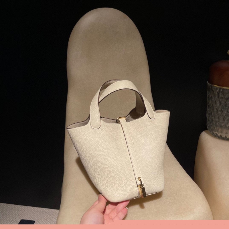 H**mes shopping bags